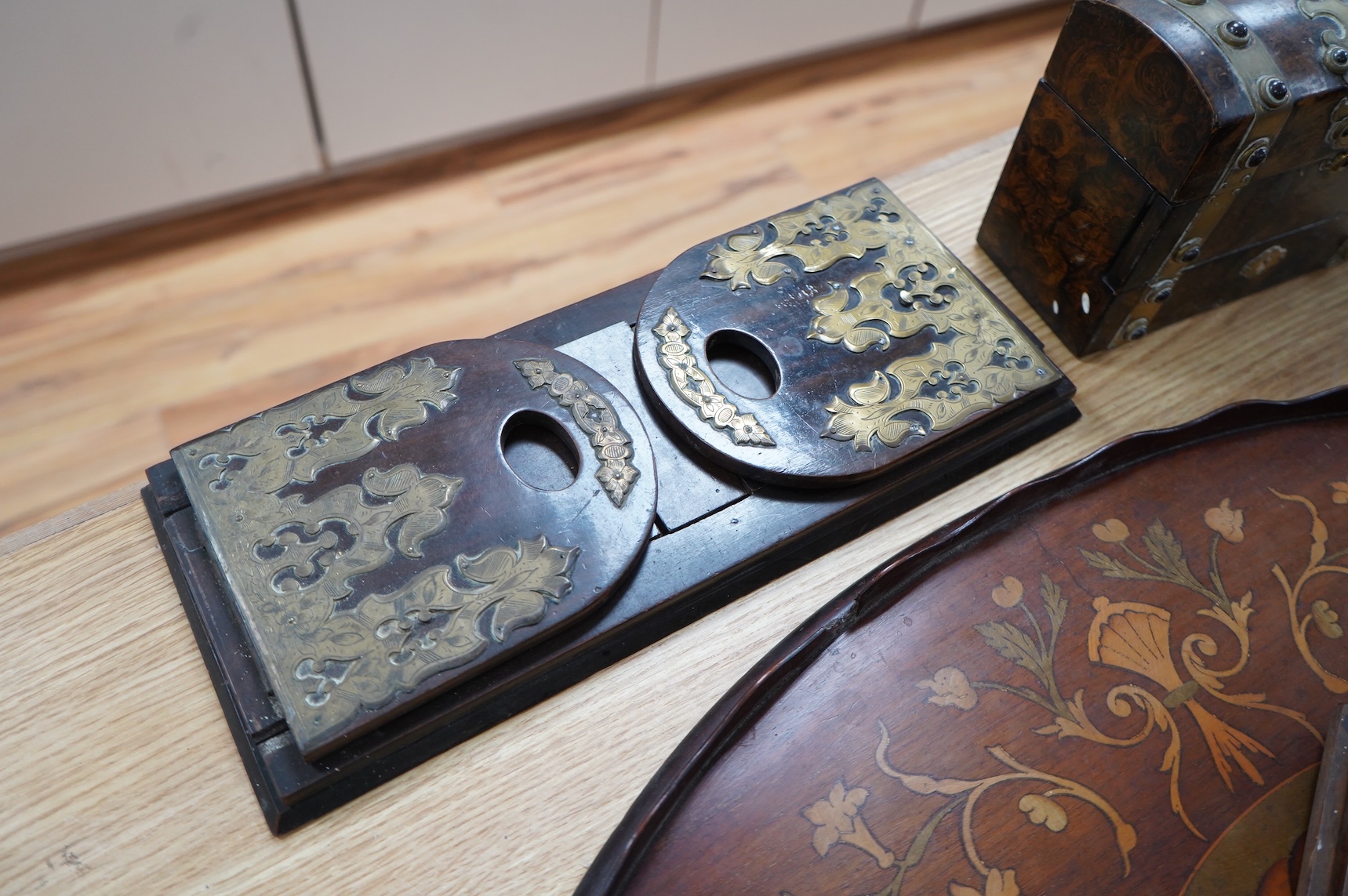 A Victorian domed scent bottle casket, two brass mounted book slides and a marquetry tray, 68cm